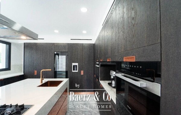 photo 5 Live Steps from the Sea: Brand-New Designer Mansion with Pool, Gym & Smart Home