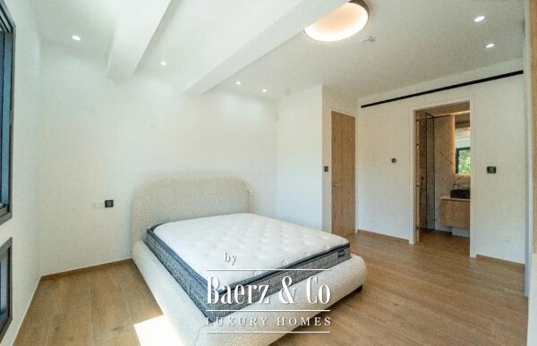 photo 14 Live Steps from the Sea: Brand-New Designer Mansion with Pool, Gym & Smart Home